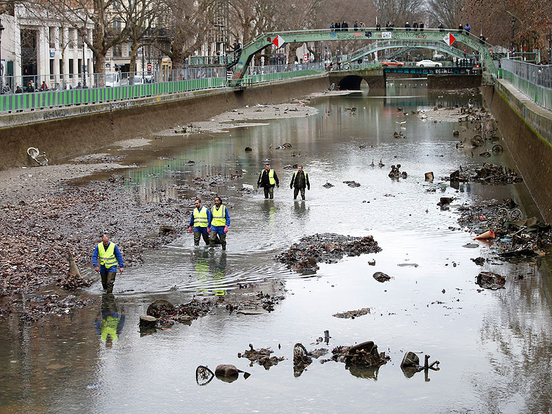 Paris Drains Canal SaintMartin, Finds Bikes and a Gun