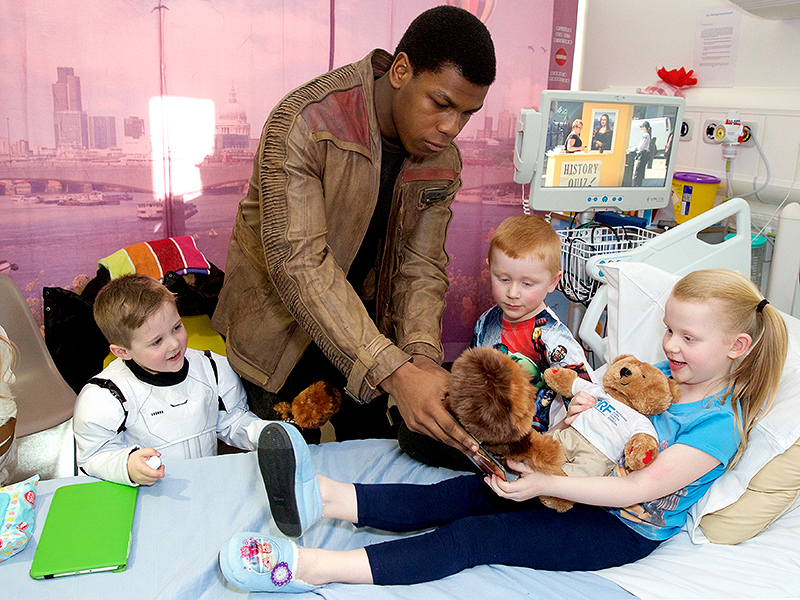 Cute Alert! John Boyega Surprises Sick Children with Star Wars Toys| Star Wars, Real People Stories, John Boyega