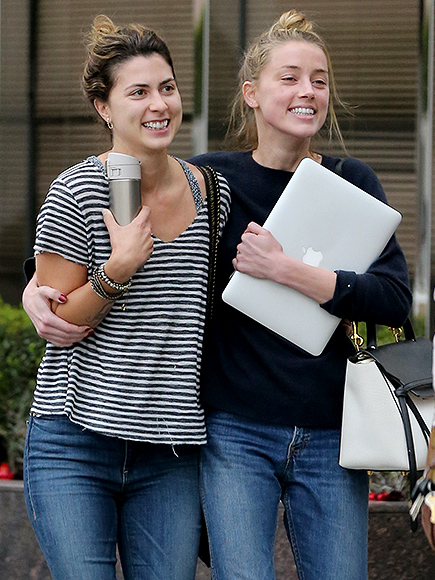 Amber Heard Laughs with Friend while Leaving Legal Meeting : People com