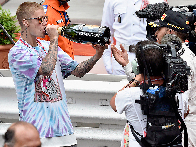 Popping Bottles! Justin Bieber Helps Celebrate Lewis Hamilton's Grand Prix Win by Taking a Giant Swig| Music News, Justin Bieber