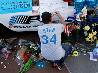 Dallas Residents Pay Respects to Five Fallen Officers in Patrol Car Memorial