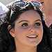 Ariel Winter Escapes the Summer Heat in a Strappy One-Piece Swimsuit