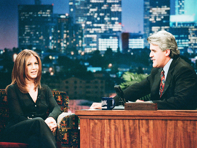 Aniston's father is Greek and a native of Crete; she and her family lived there for a year when she was a child, which she discussed in a 1996 appearance on The Tonight Show.