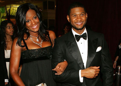 Usher on paid aby photographs