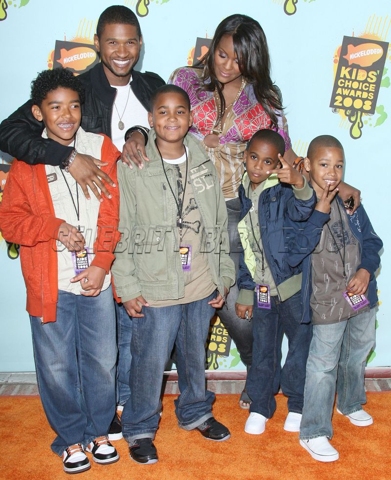 R&B star Usher, 29, his wife Tameka Foster, 37, and her three sons from her 