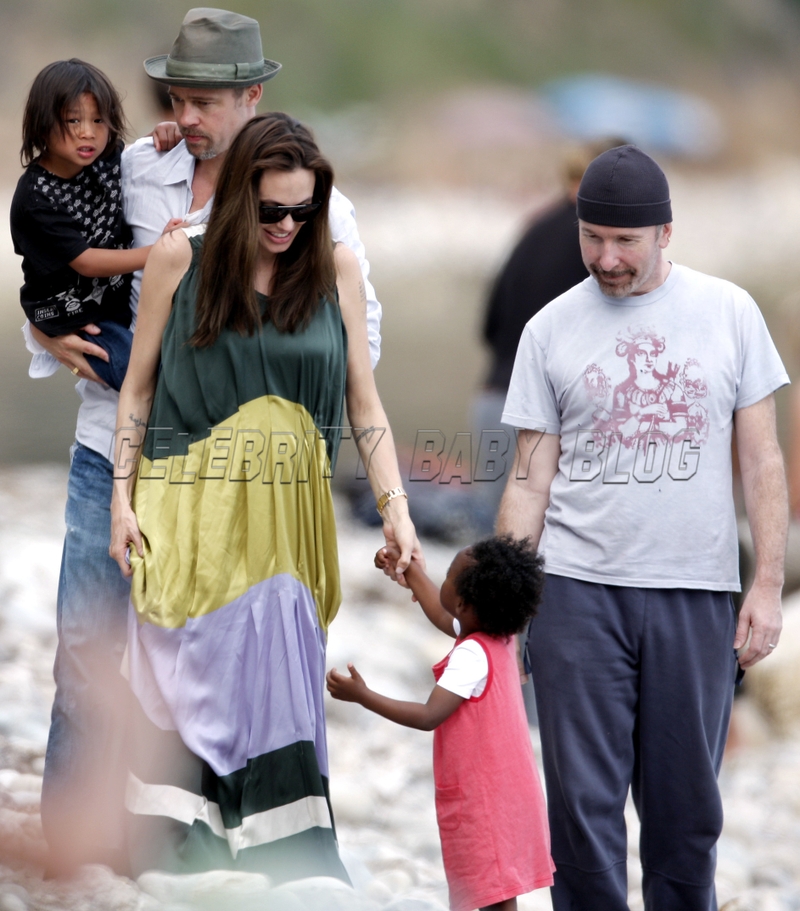Brad Pitt Angelina Jolie and kids play at the beach