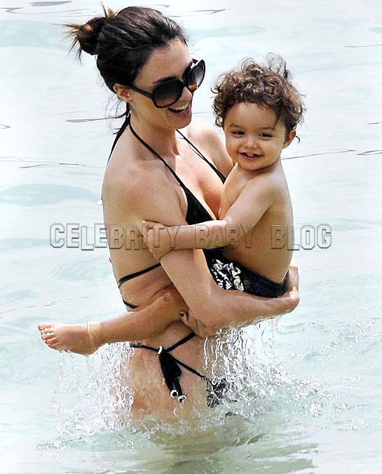 Red Curly Hair Baby. Water Baby: Paz Vega and Orson