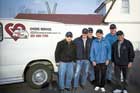 Chore Service home repair volunteers in front of their van