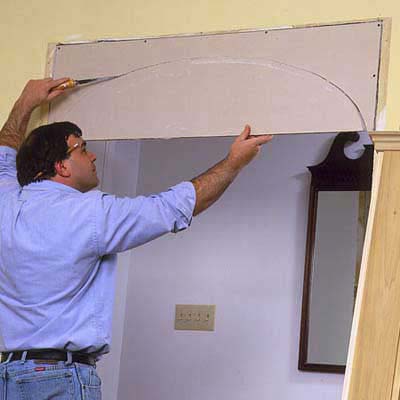 Remove the columns and cut the elliptical shapes from the drywall pieces