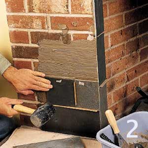 use a rubber mallet to set slate tiles in mortar