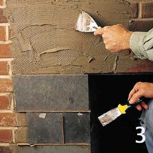 spread mortar on bricks above firebox