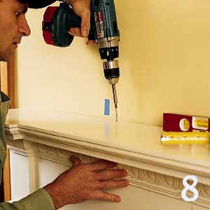 tilt mantelpiece into place
