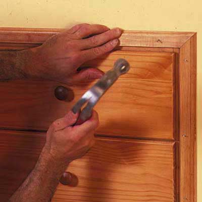 finish the knee-wall storage installation with attractive wood trim to  match dresser