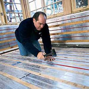 Richard installs in-floor heating