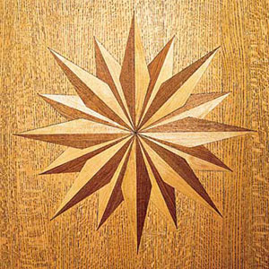 wood flooring with inlaid medallion