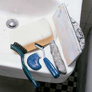 grouting kit, clean-out brush, cutter, grout saw, utility knife, trowel, sponge/abrasive pad.