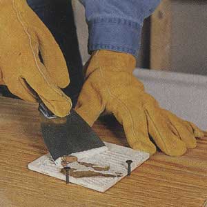 scraping ceramic tiles