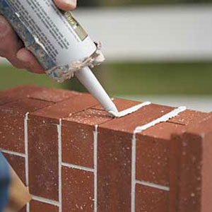 sanded caulking a doghouse