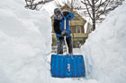 don't damage the driveway digging out your car