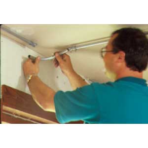 Screw outlet box to the house
