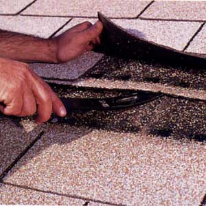 fixing roof shingles