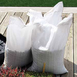 premeasured sacks of soil help ease the job of spreading growth medium