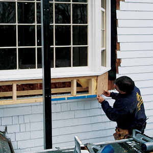 sheathing the extension of the bay's bottom for the window seat addition