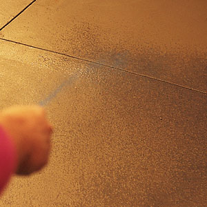 A chemical retarder that has sugar as a primary ingredient is sprayed on the surface to slow the setting time. The retarder penetrates only the top 1/16-inch, allowing the concrete underneath to set at its normal rate. 