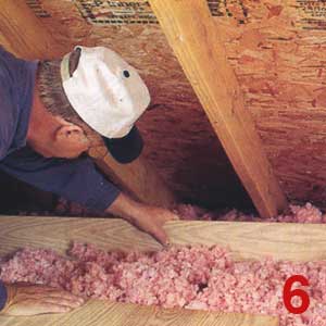USE A SHORT board or garden rake to pull loose insulation away from the eave so it doesn't block airflow. 