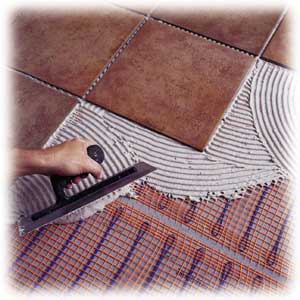 Lay the tile. Any type of tile can be installed. Complete the grout work and your floor is done.