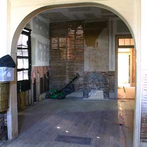 arched passageways above white oak floor