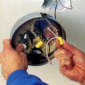 disconnecting the old light fixture 