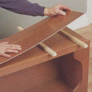 sheathing them with a plywood skin 