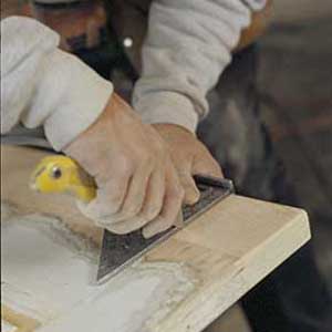Extend the joint line across the filler piece by scoring it with a utility knife.