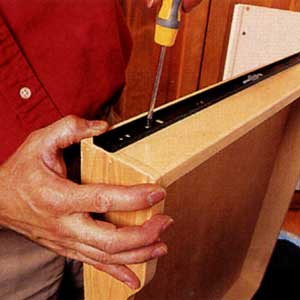 Step Seven;  screw in sliding rail of drawer slide