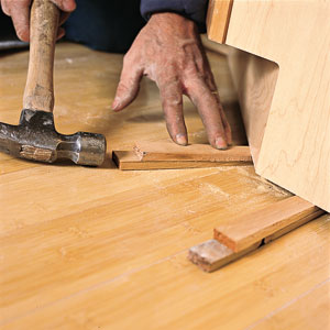 installing shims under cabinets