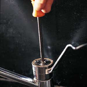 remove the single screw to free the faucet lever