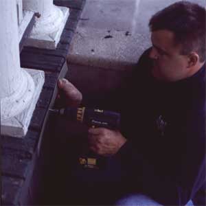 attach the straps for a downspout