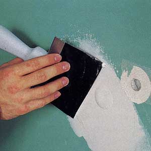 repairing drywall holes