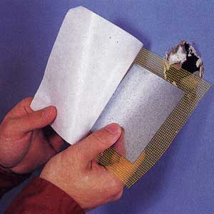 repairing drywall holes