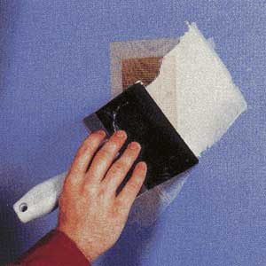 repairing drywall holes