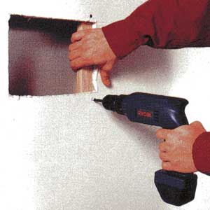 repairing drywall holes