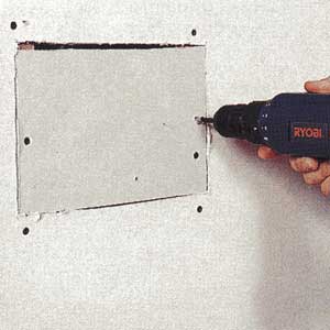 repairing drywall holes
