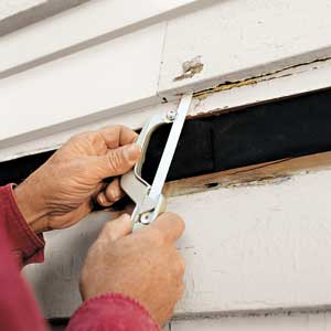 cut stubborn nails with a hacksaw