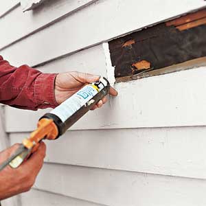 caulk the space for new clapboard