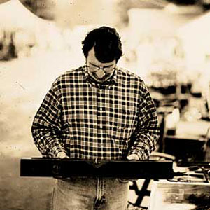 Norm Abram with a brass-bound level