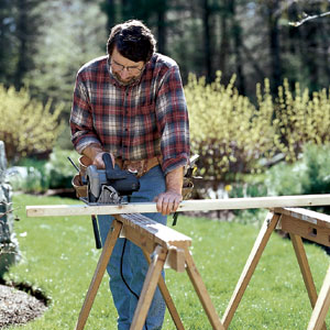 Norm Abram setting up wood on sawhorses