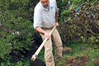 man w/ hoe