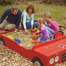 race car shaped sandbox for kids and adults to build