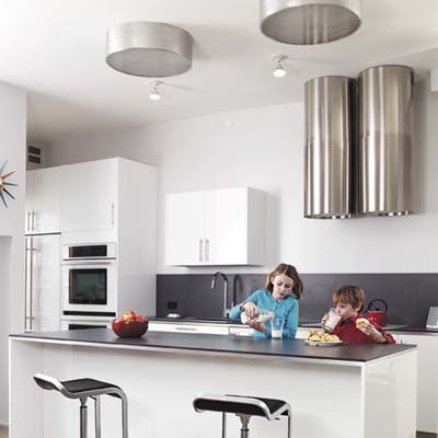 Bright Kitchen Lights on Open Plan Kitchen With Reflective Surfaces And Bright Lights